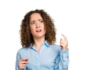 Closeup portrait young business woman, thinking, daydreaming deeply about something, looking confused, trying remember something isolated white background. Negative emotion,facial expression reaction