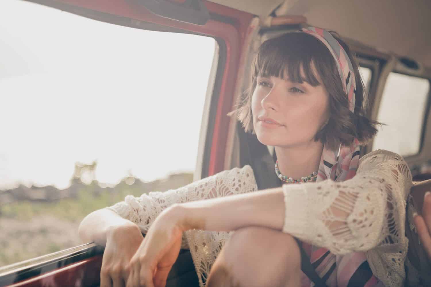 Photo of dreamy lady ride car summer countryside look magnificent landscape wear boho outfit nature seaside outdoors