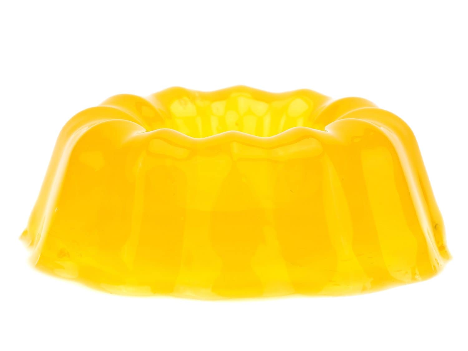 Yellow peach jelly pudding on a white background