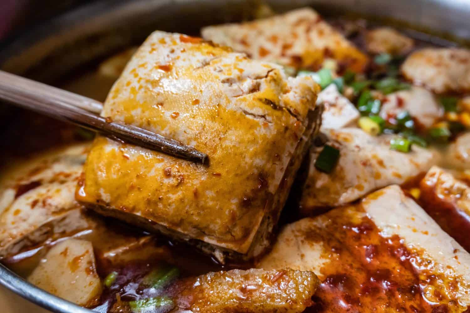 Stinky tofu hotpot is a famous Taiwanese street food known for its unique smell and flavor. It is a popular choice among locals and tourists alike, especially during the colder months.