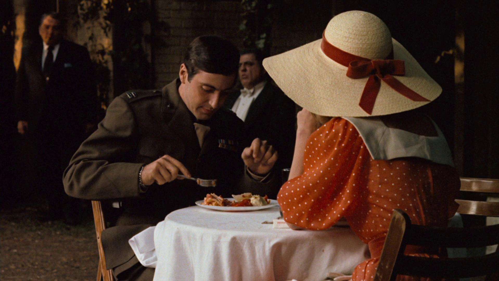 Al Pacino, Diane Keaton, and Lenny Montana in The Godfather (1972)