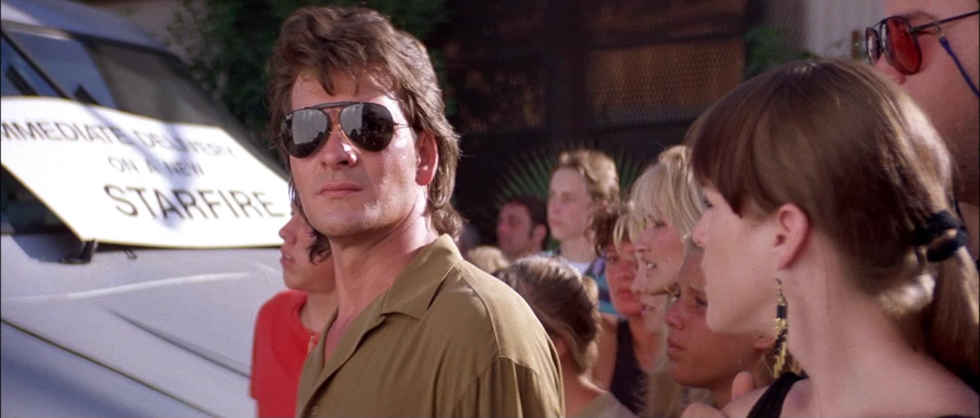 Patrick Swayze and Kathleen Wilhoite in Road House (1989)