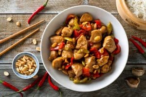 Delicious Kung Pao Chicken with peppers, celery and peanuts.