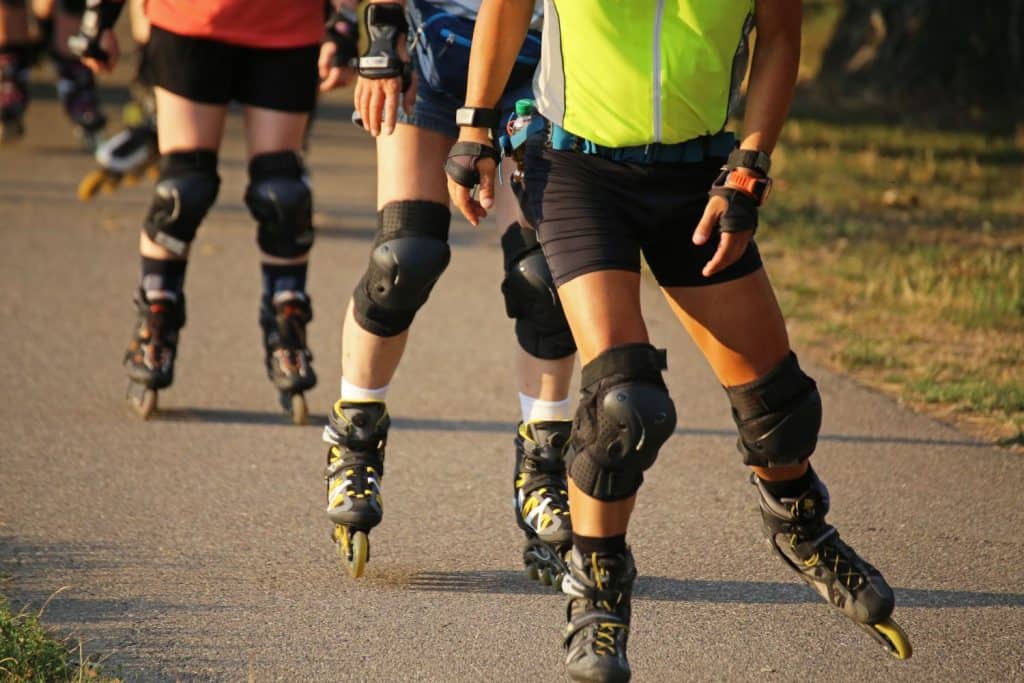 Group of rollerblader (skater) in the evening sun