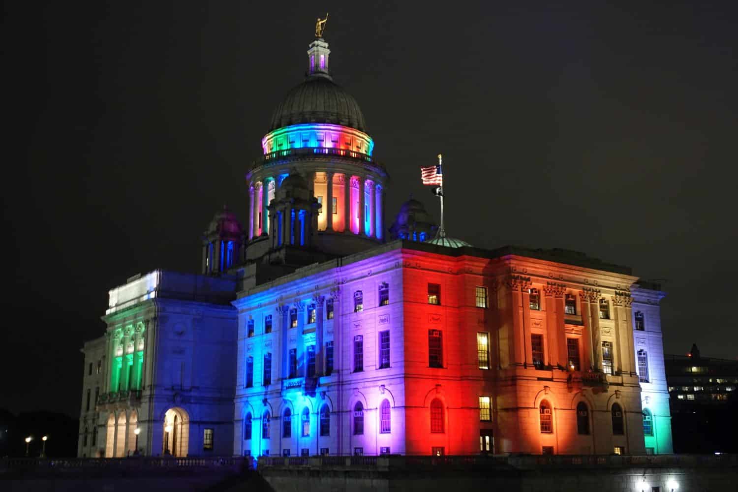 The illuminated Rhode Island State House capitol building in Providence, RI