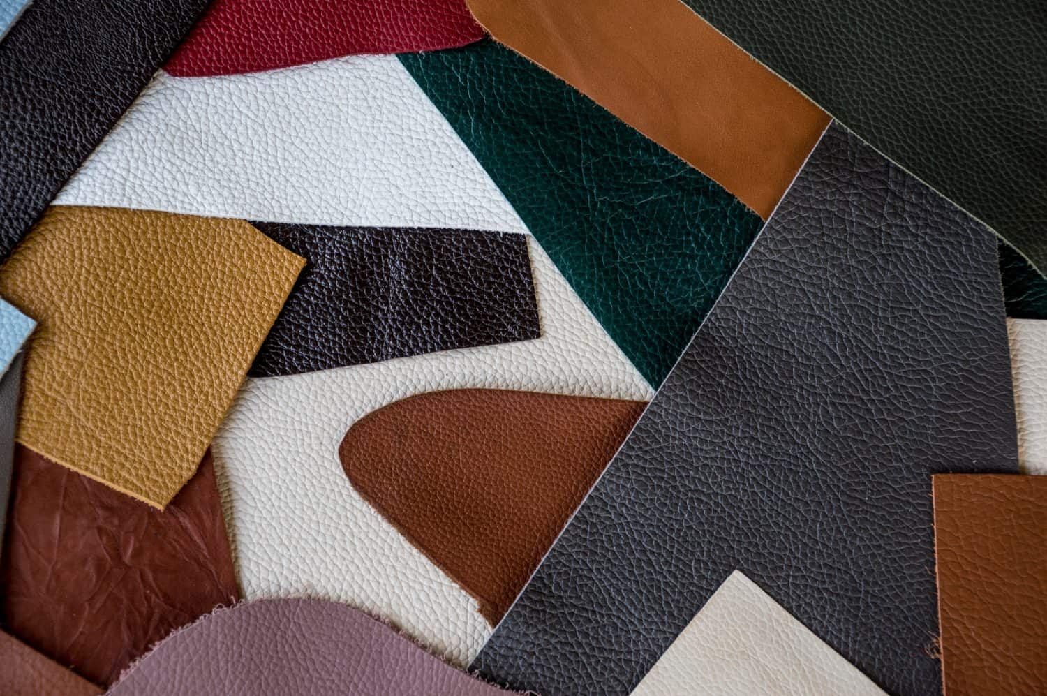 Pieces of multicolored leather for needlework, patchwork.