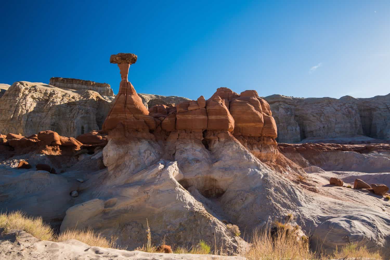 Toadstool rock formations near Kanab, UT. USA. These geologic wonders are caused by erosion of soft sandstone underneath the harder stone on top, giving the impression of a 'toadstool'.