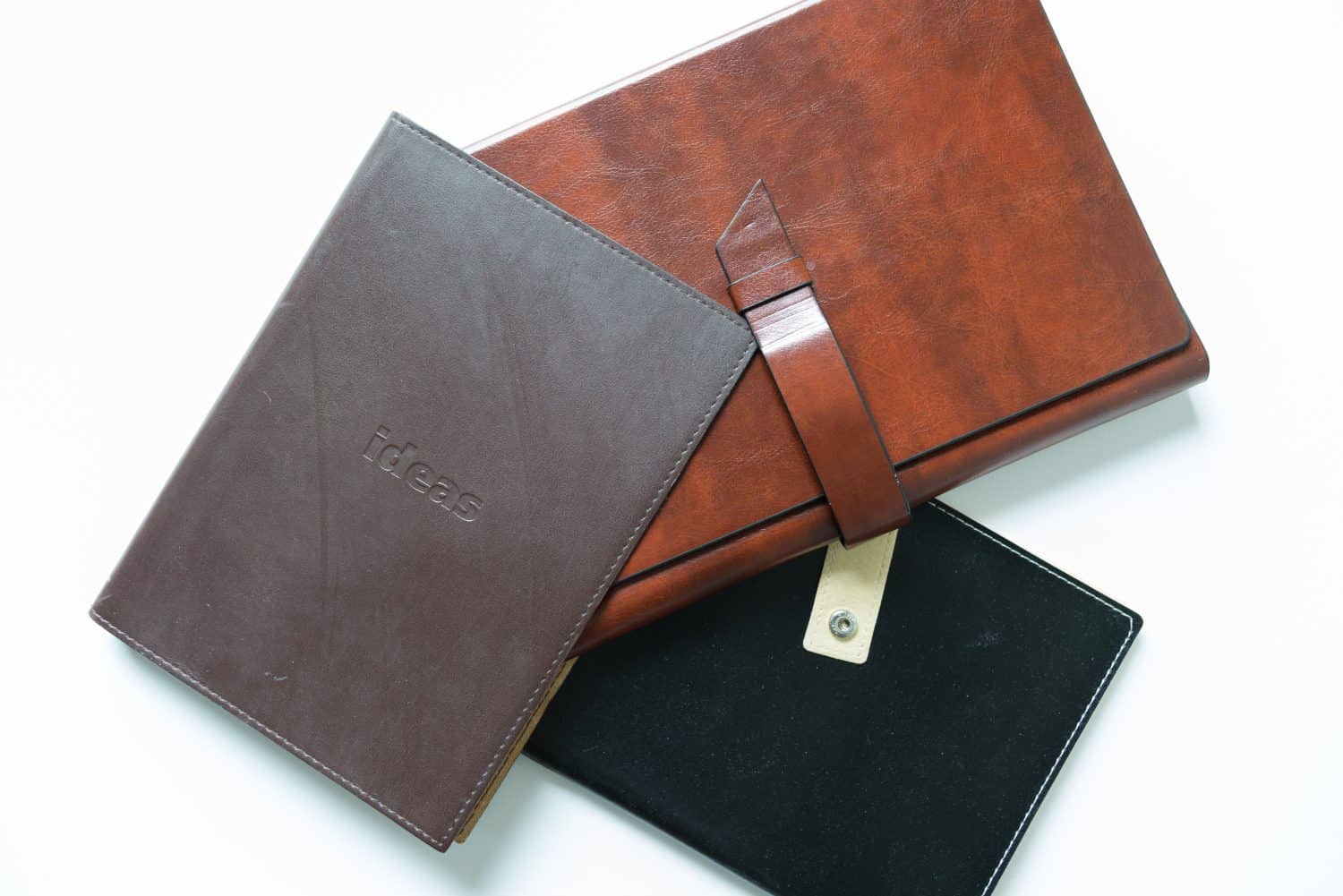 three book or journal slip case made of vinyl or bonded leather on white