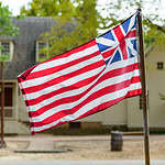 Who gets credit for designing the first American flag?