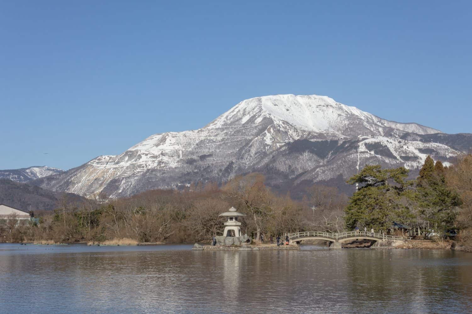 Winter Mount Ibuki seen from the shore of Pond Mishima