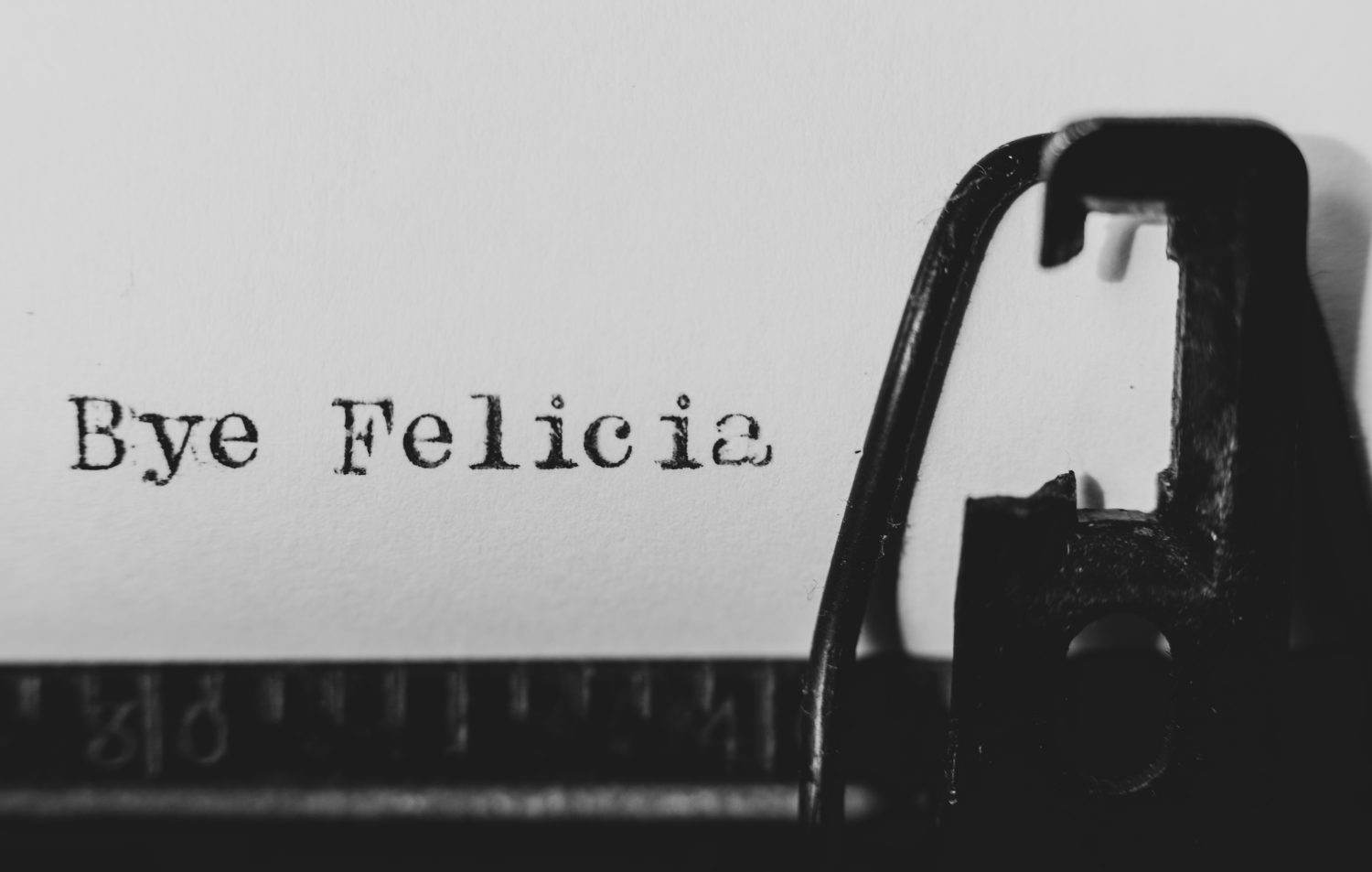 Bye Felicia typed with an antique typewriter on vintage typewriter paper in black and white with some added grain to achieve a vintage look