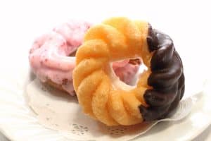 French cruller and old fashioned strawberry chocolate doughnuts