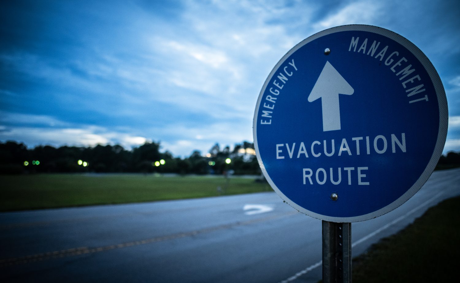 A Hurricane Evacuation Route sign leads evacuees to safety.