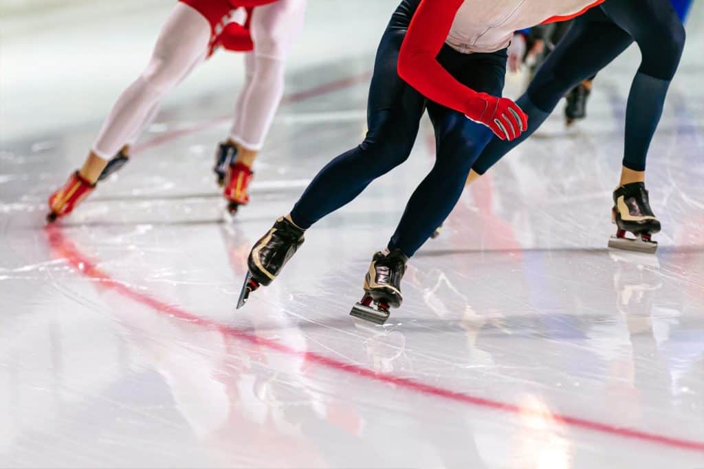 legs group athletes skaters in speed skating