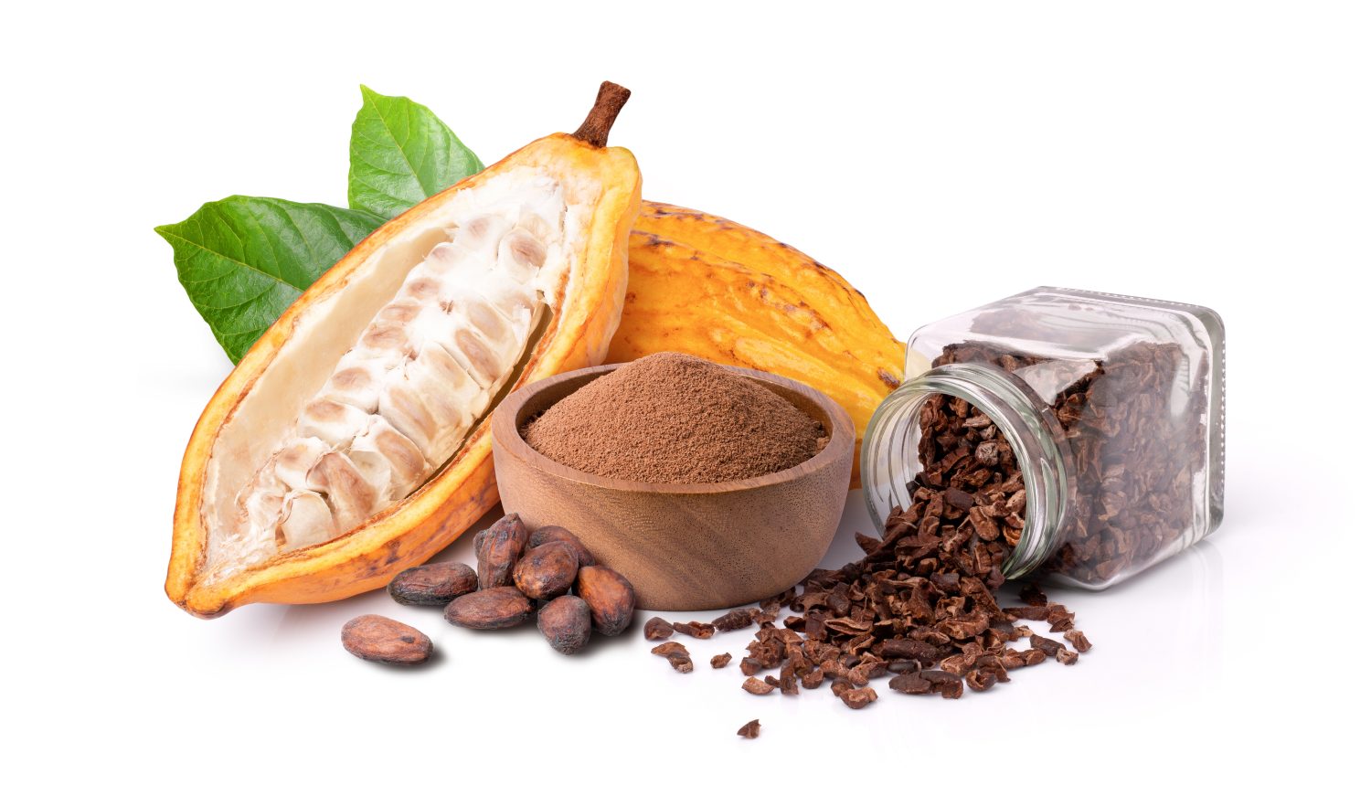 Cocoa fruit with powder in wooden bowl, dry cacao beans and cocoa nib in glass bottle isolated on white background.