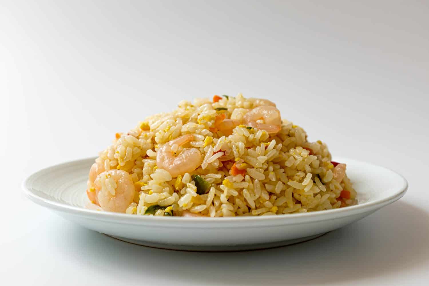Shrimp fried rice on white background