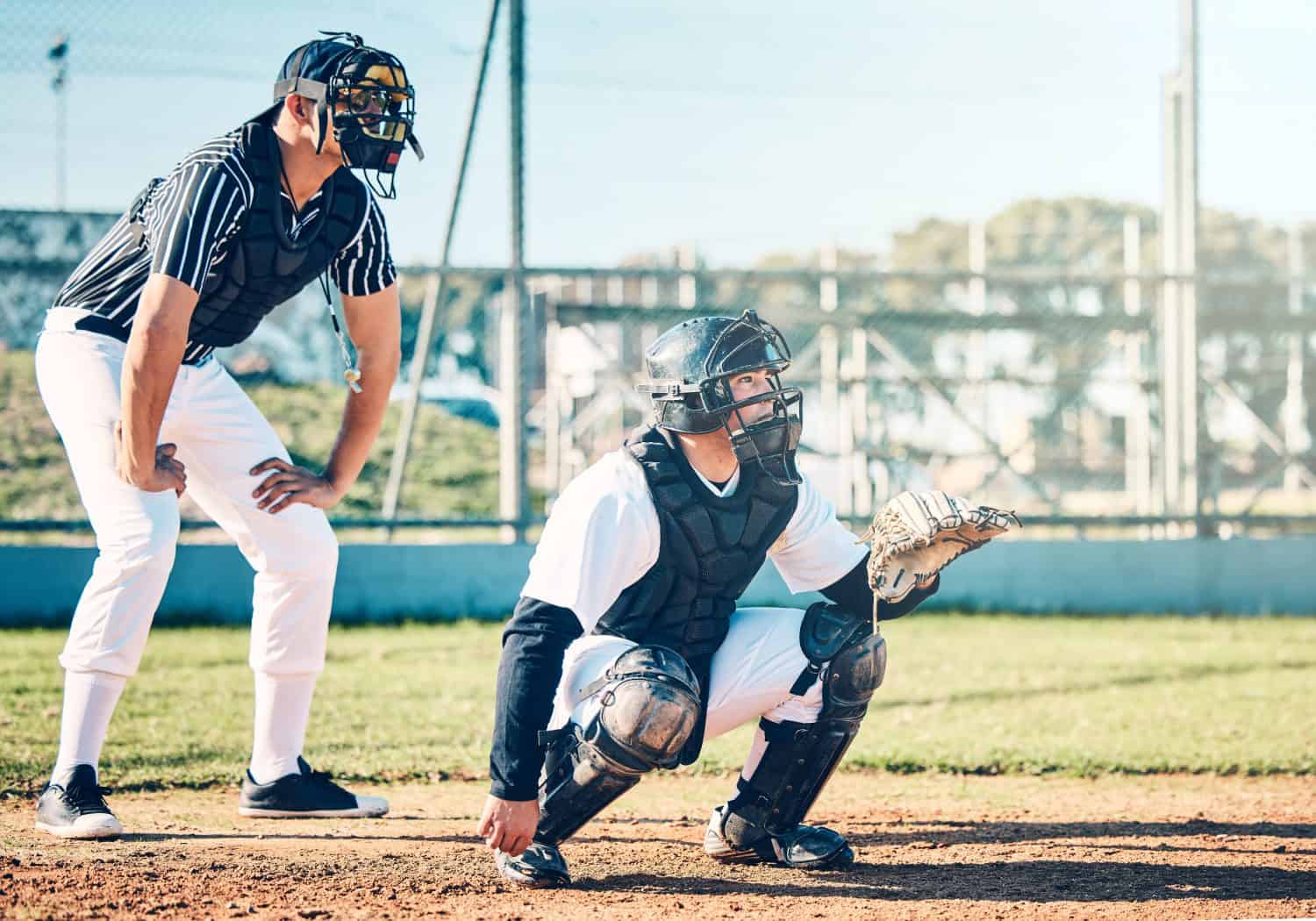 Sports, baseball and umpire with man on field for fitness, pitching and championship training. Workout, catcher and exercise with athlete playing at stadium for competition match, cardio and league