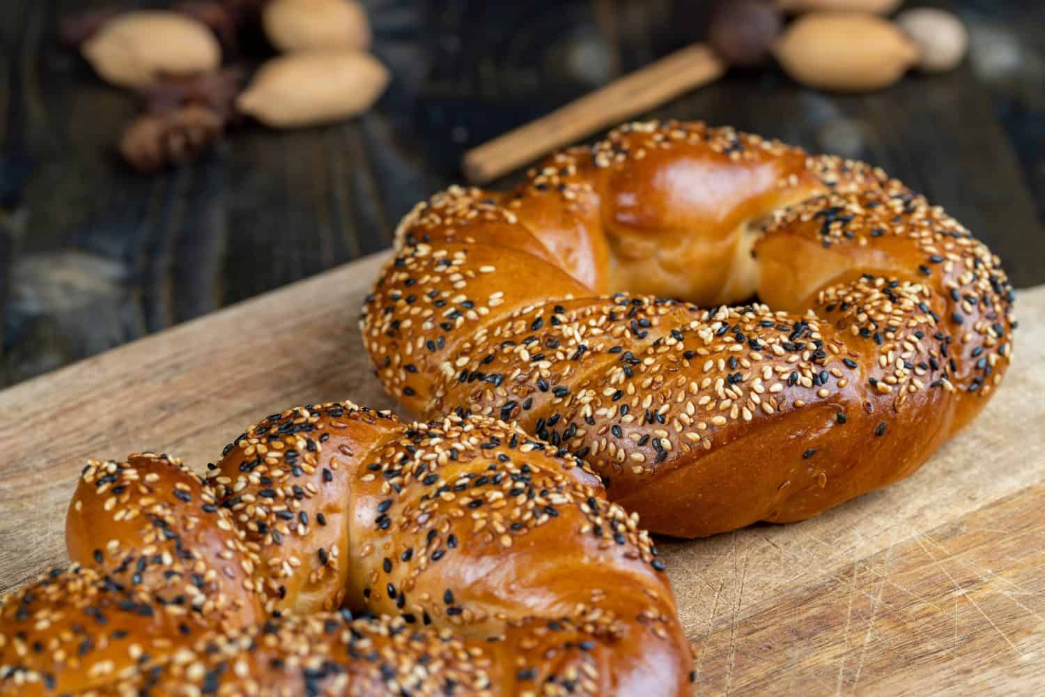 soft and fresh wheat bagel sprinkled with white and black sesame seeds, cooked wheat flour bagels and covered with sesame seeds