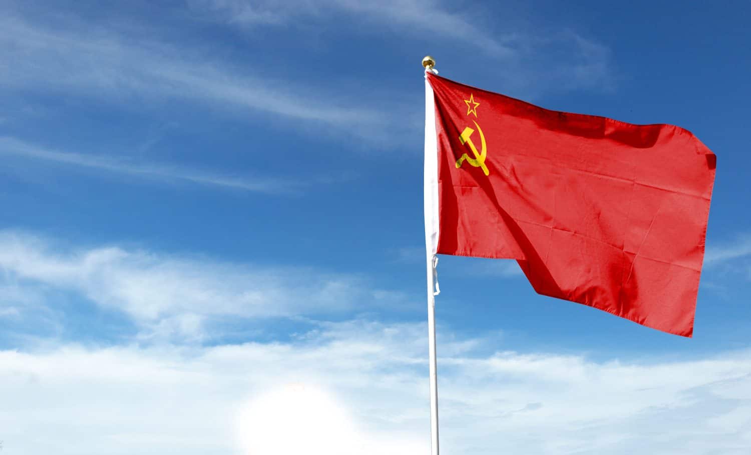 Soviet Union flag on cloudy sky. waving in the sky