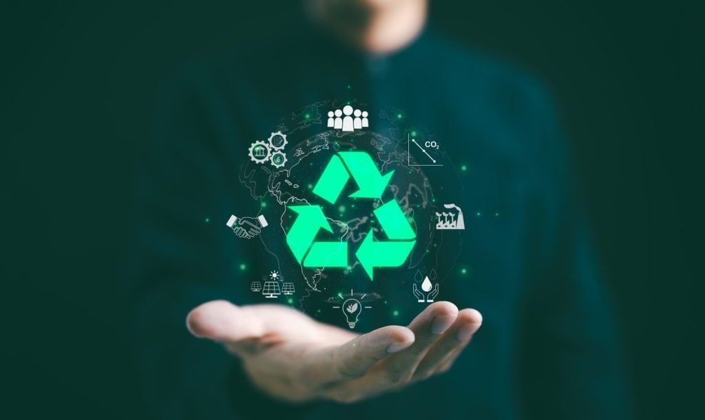 Recycling icon, Sustainable Development Concept. Man present glowing recycling, surrounded by various sustainability symbol, representing concepts of eco-friendly practices and sustainable development