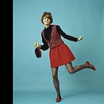 A women modeling ’70s fashions