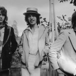 Rolling Stones Mick Taylor, Mick Jagger, and Charlie Watts pose in Paris