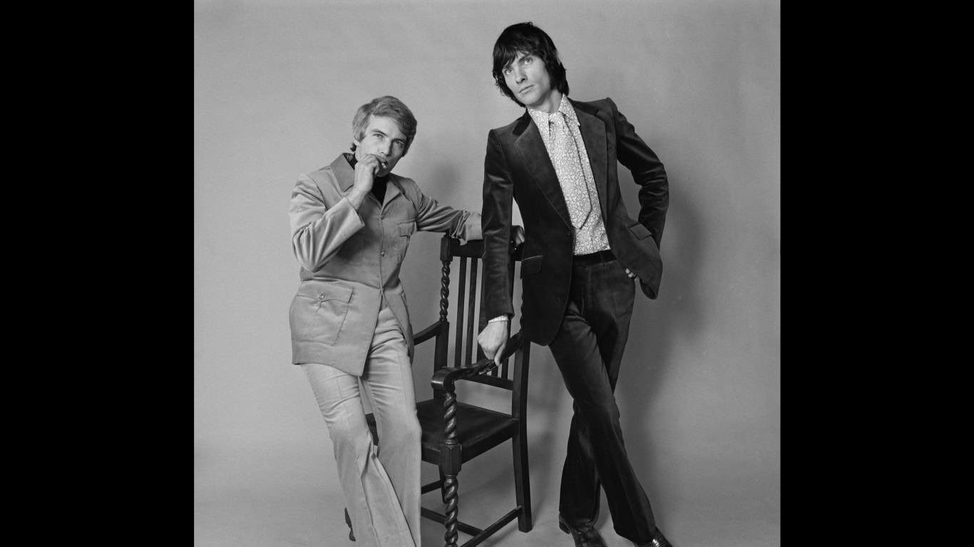 Two British male models in ’70s-style velvet suits