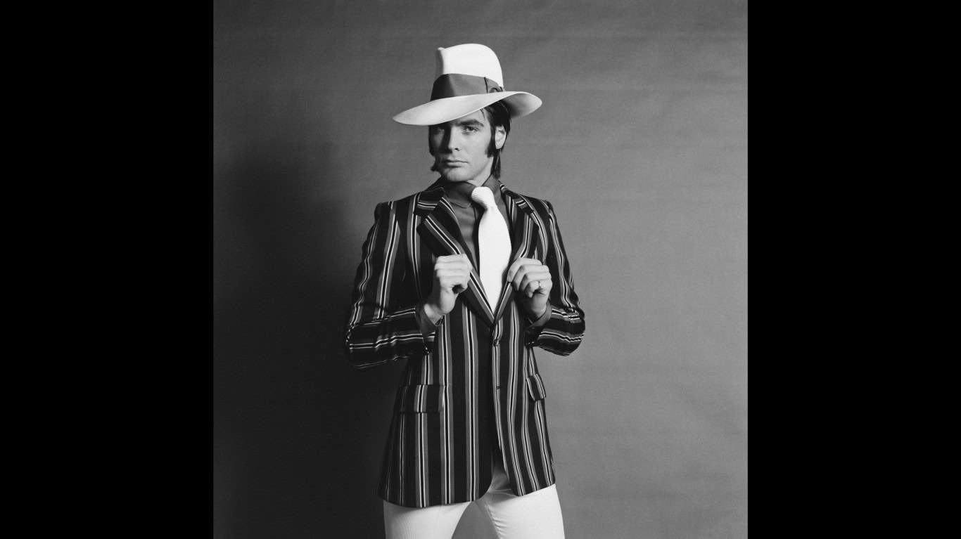 An English male model in striped blazer and fedora