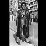 James Brown in a leather duster
