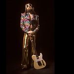 A glam rocker in a shiny jacket