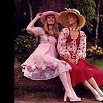 Models in summer dresses and sun hats