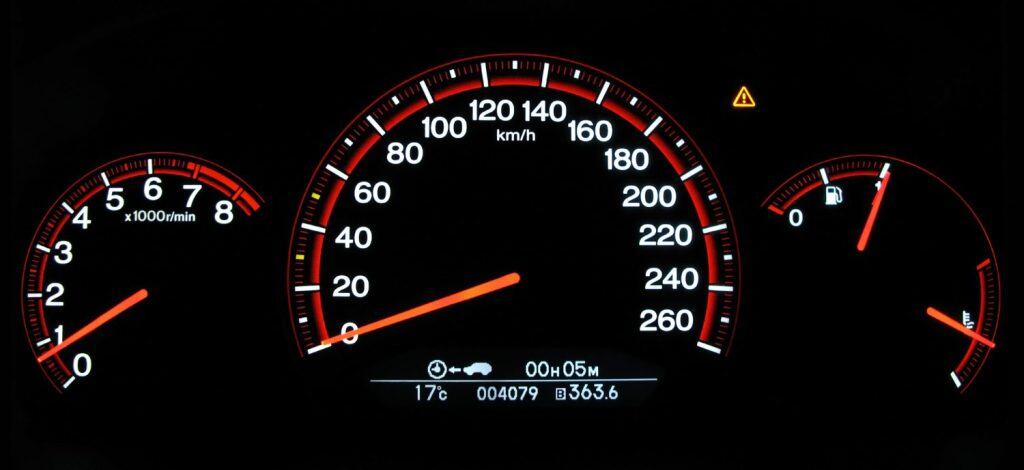 Autovehicle (Honda Accord 2007) dashboard: tachometer, speed-o-meter in km/h, fuel tank level and engine temperature indicator