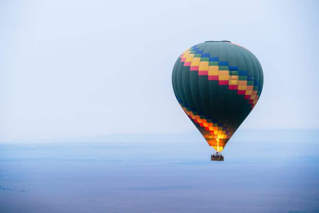 Hot air balloon being raised in the Masai Mara National Park