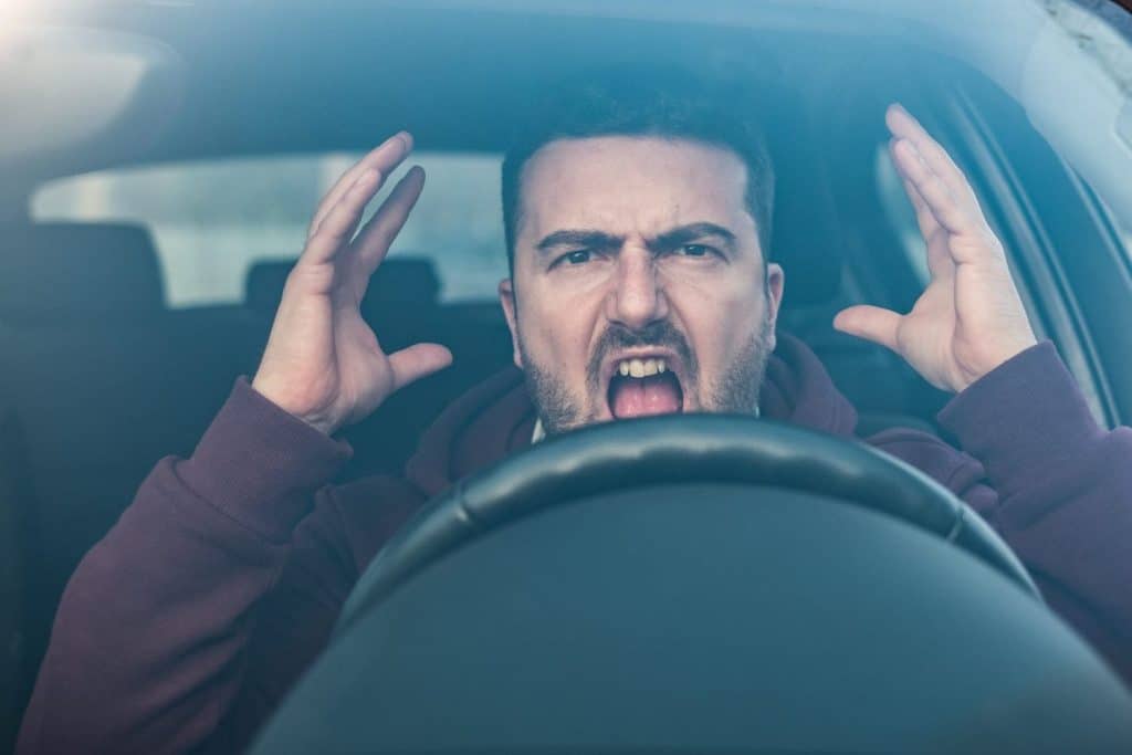 Rude man driving his car and arguing a lot