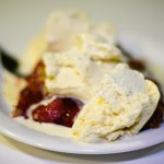 Kansas – Topping a Slice of Cherry Pie With Ice Cream on Sundays