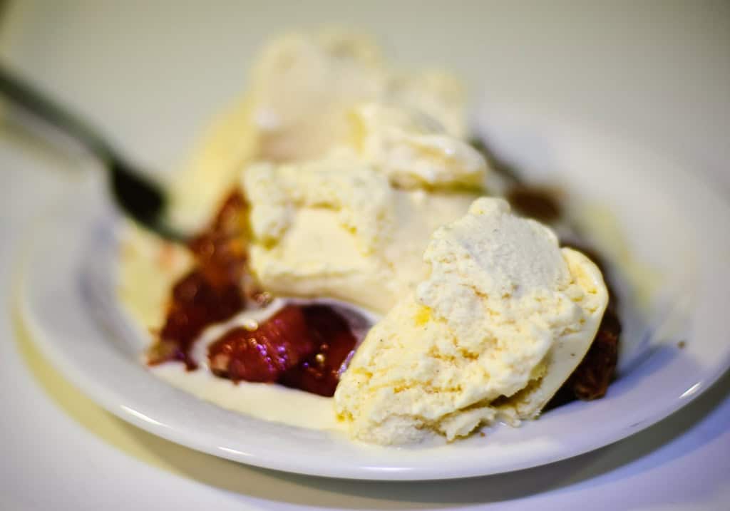 Kansas – Topping a Slice of Cherry Pie With Ice Cream on Sundays