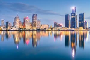 Detroit, Michigan, USA skyline at dawn on the Detroit River.