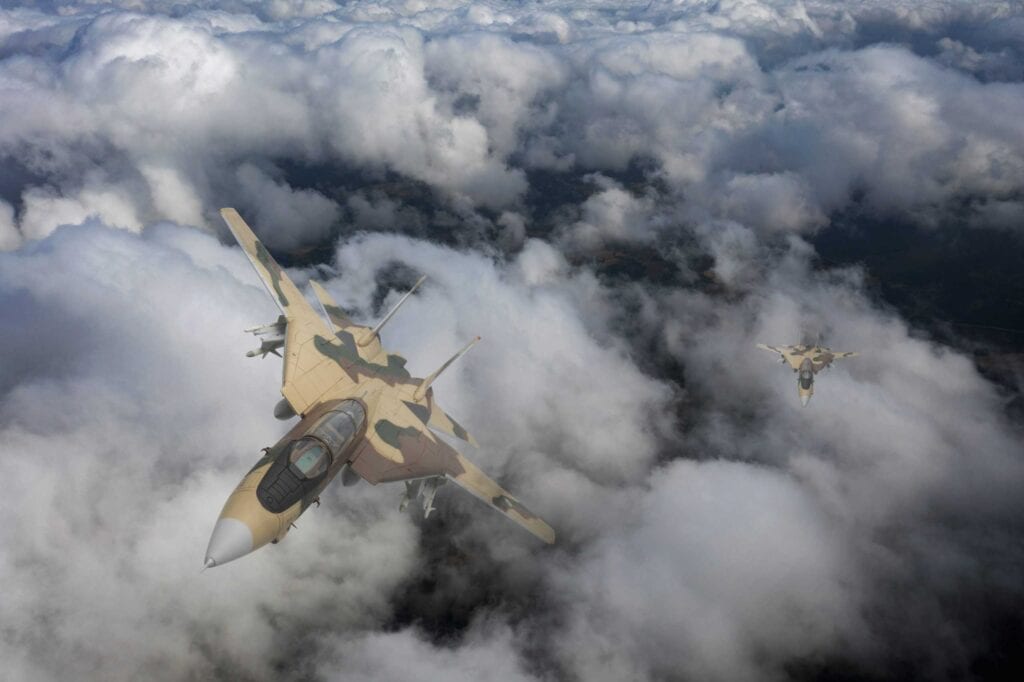 Islamic Republic of Iran Air Force Camouflaged F-14 Fighter Jets flying over clouds.