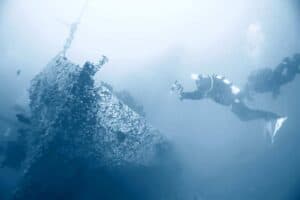 shipwreck diving landscape under water, old ship at the bottom, treasure hunt