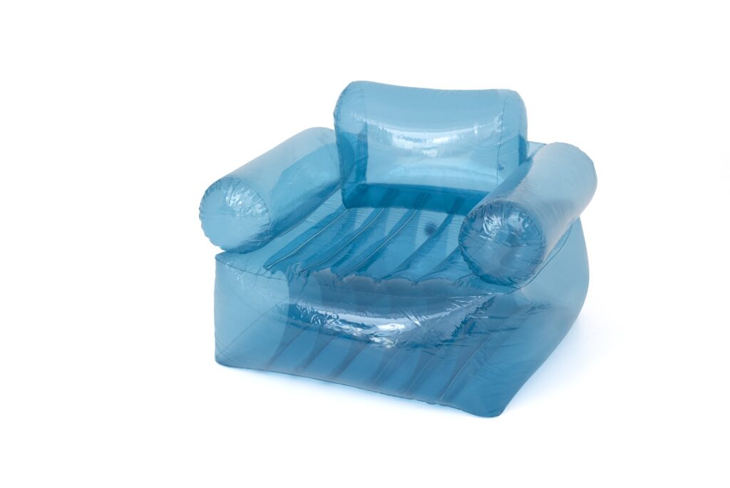 inflatable transparent  blue chair isolated on white