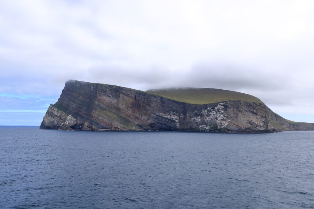 a view to the Island Foula in the Shetland archipelago of Scotland from the sea