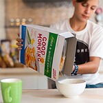 Reading the Back of the Cereal Box at Breakfast