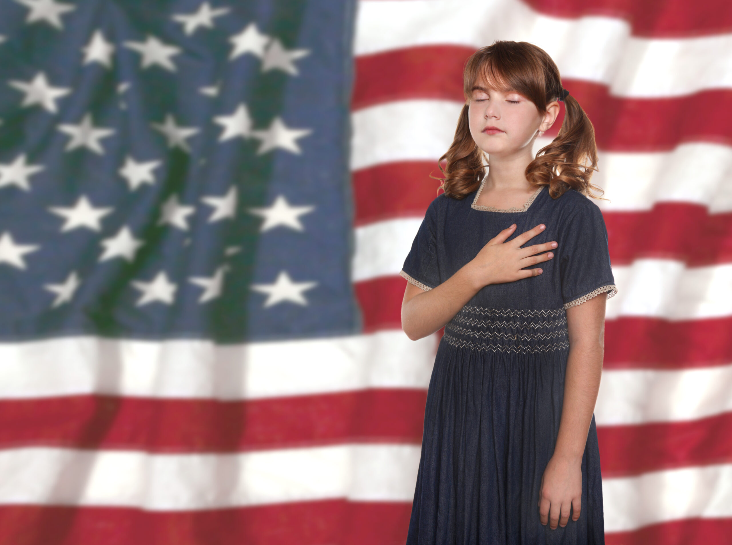 Reciting a Pledge to the Flag Every Morning at School