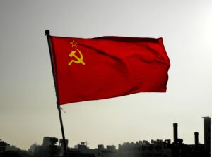 Soviet Union flag with blue sky. A symbol describing the disintegration of Soviet Russia (flag backlight)