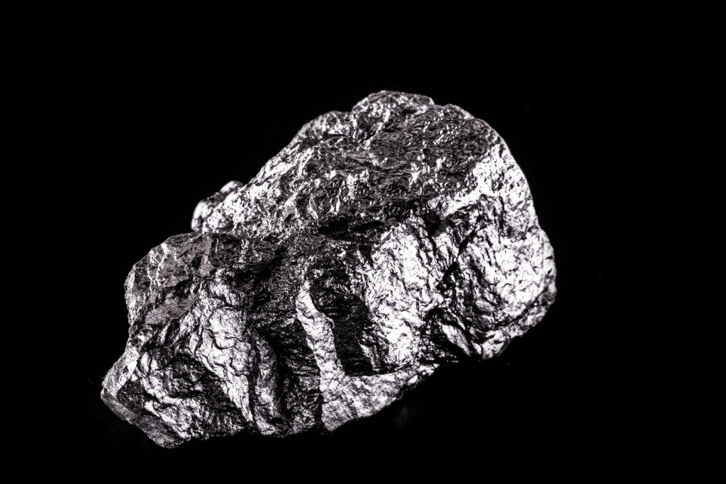 Rhodium nugget, chemical element with Rh symbol, metal for industrial use, used in jewelry and automatic equipment.