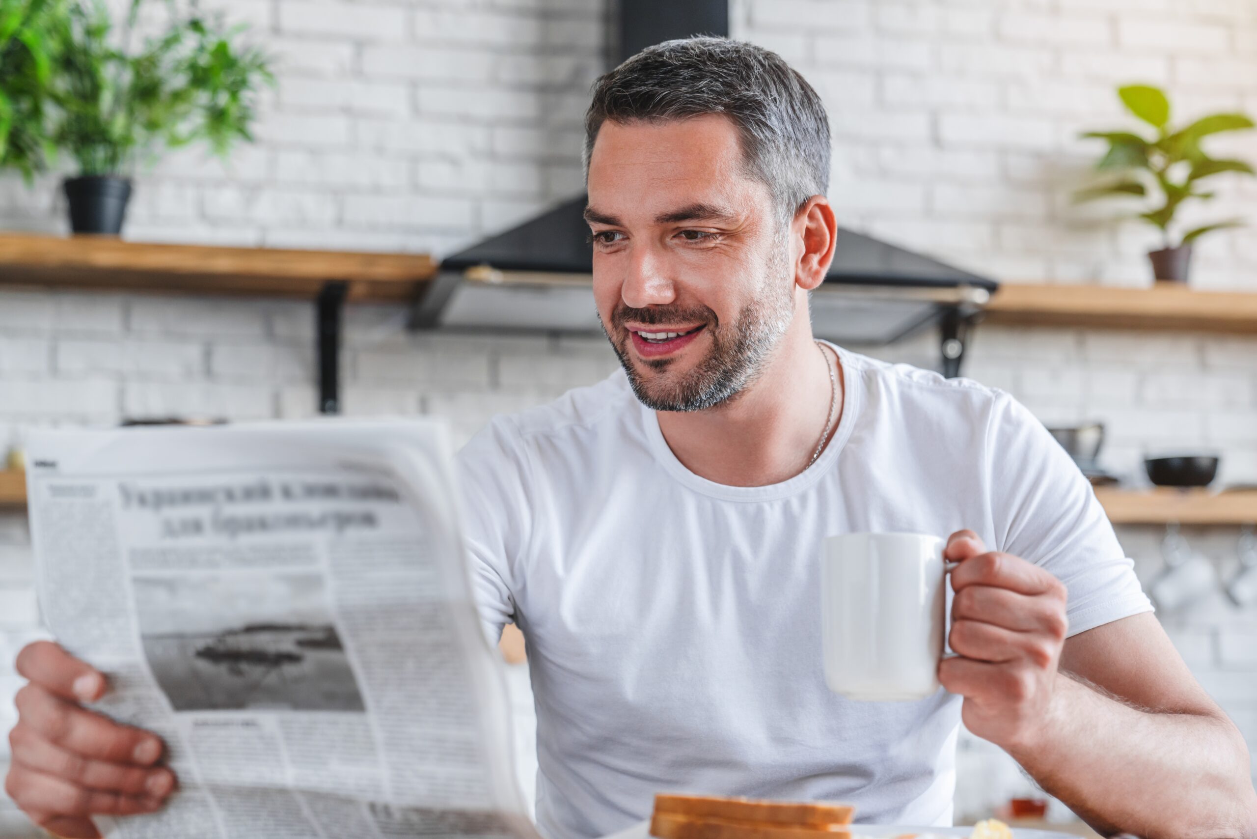 Reading the Newspaper at Breakfast