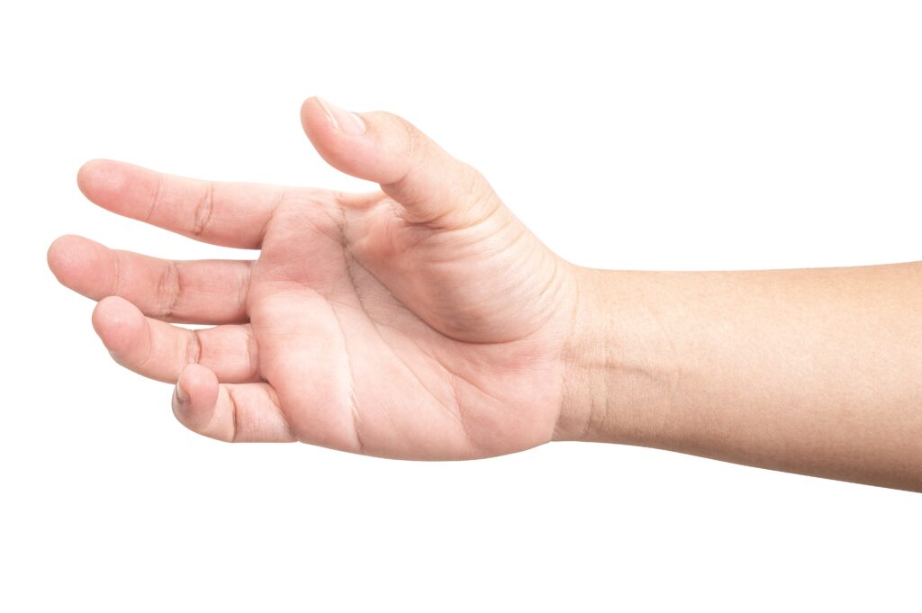 Close up male hand holding something like a bottle or can isolated on white background with clipping path.