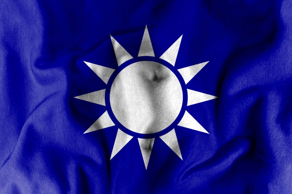 The Kuomintang flag is made of fabric patterns. Concept map depicting dialogue with the international community. Basemap and background concept. Double exposure hologram.