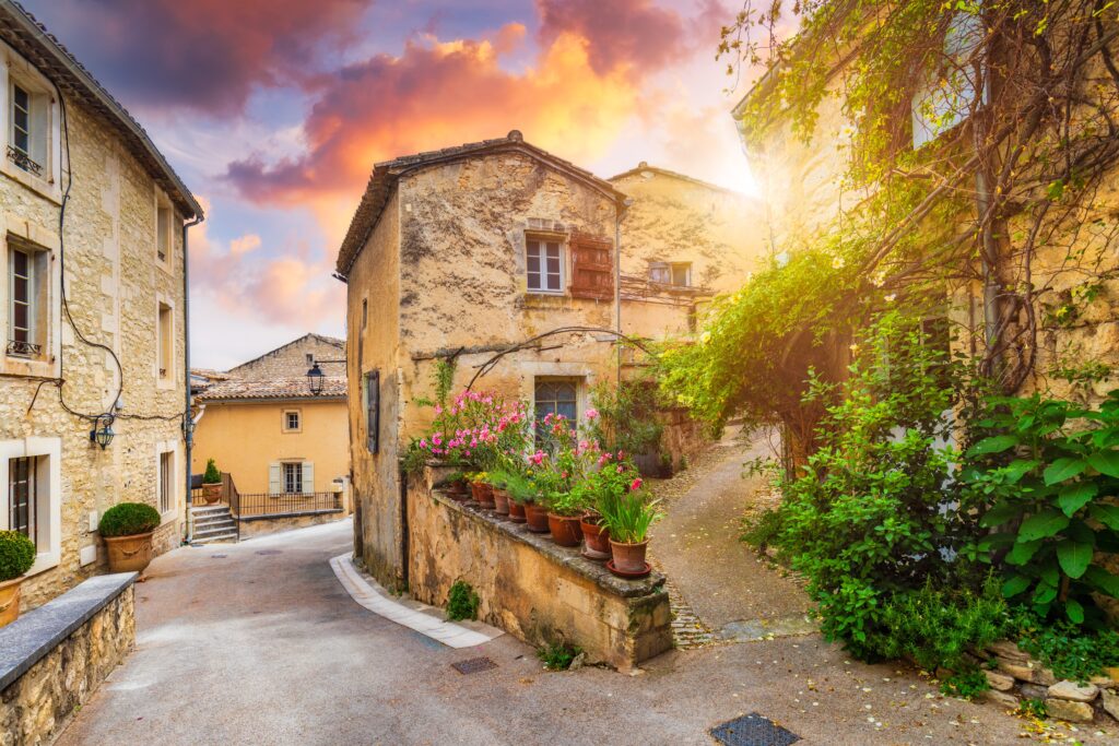 Menerbes village in Provence on a summer day, France, Luberon, Vaucluse. Village of Menerbes, the village and the Luberon mountains also called the most beautiful village of Luberon, France, Provence.