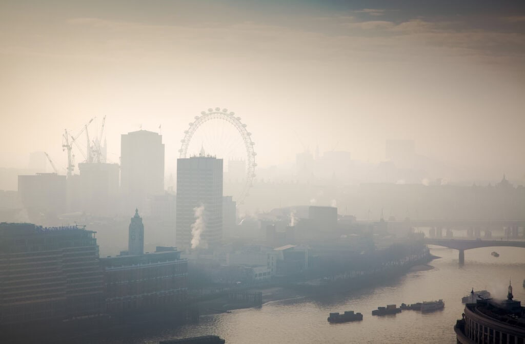 rooftop view over London on a foggy day from St Paul's cathedral, UK